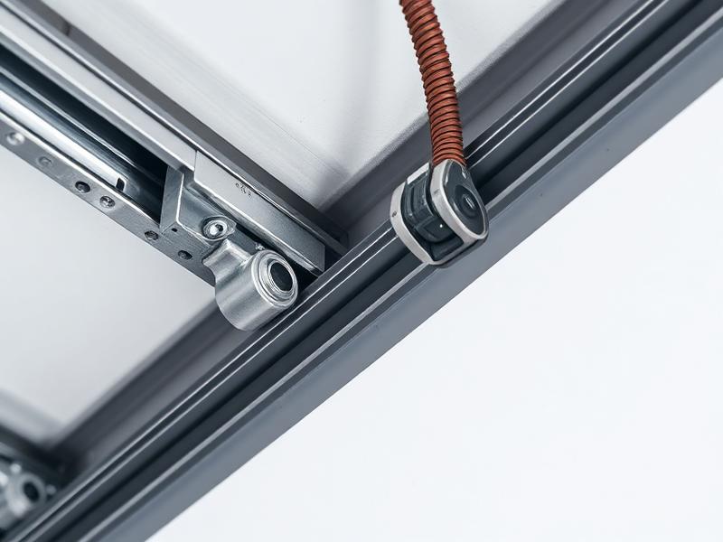 Professional technician aligning garage door tracks with precision tools for smooth operation